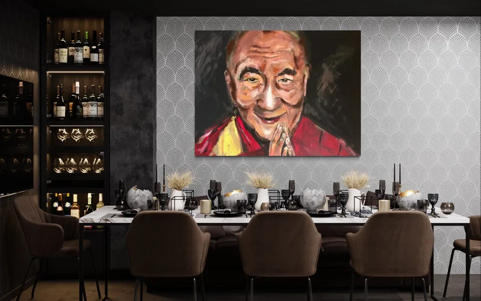 Yana Yank's portrait of the Dalai Lama in saffron and red hanging above a long dining table in a dark, elegant dining room