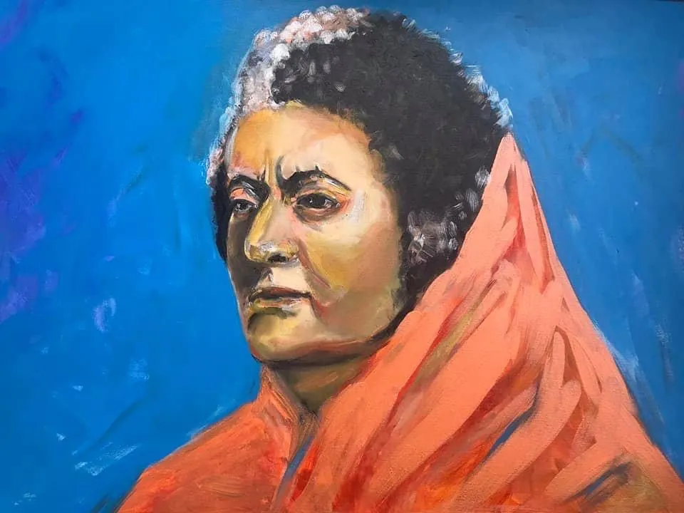 Portrait in Saffron by Yana Yank: a woman with greying hair wrapped in a saffron-orange shawl against a cobalt-blue background