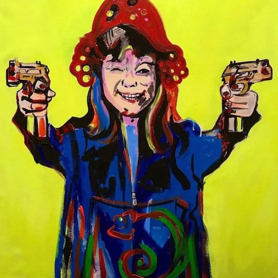 Red Heat by Yana Yank: a laughing girl in a red hat and blue jacket aiming two pistols, against a bright acid-yellow background